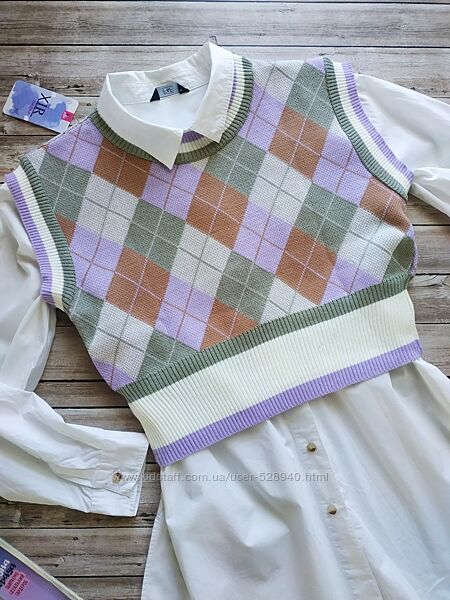 Актуальна жилетка в ромб
