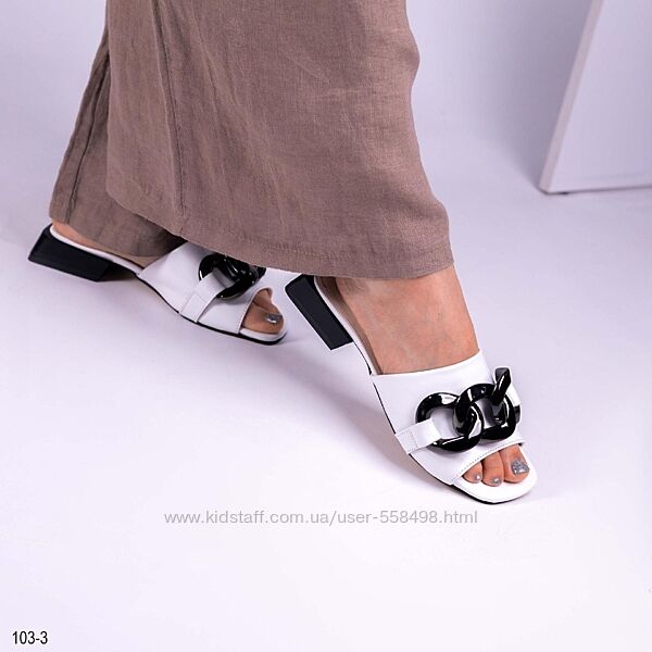 Красиві білі шльопанці з натуральної шкіри