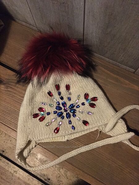 Зимова шапка меріносова шерсть обєм 52 54 56 мега помпон єнот 