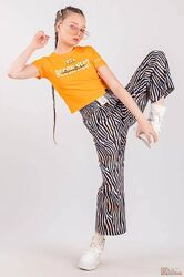 Штани для дівчинки з принтом у вигляді зебри та помаранчевими вставками LOCOLOCO
