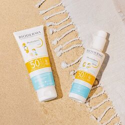 Дитячий сонцезахисний спрей та молочко Bioderma Photoderm Pediatrics SPF50 