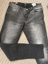 Чорні стрейчеві джинси для підлітка jack and jones італійські в ідеальному 