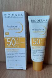 Bioderma Photoderm - сонцезахисний флюїд для комбінованої шкіри обличчя.