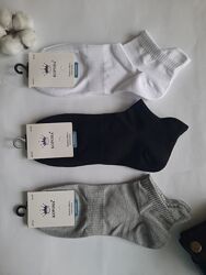 Шкарпетки чоловічі короткі однотонні з фіксуючою резинкою на стопі 