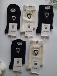 Шкарпетки жіночі бавовняні ультрависокі однотонні з вишивкою різні якість