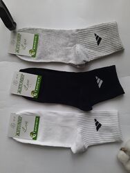 Шкарпетки чоловічі з бердовим значком однотонні на тенісній резинці
