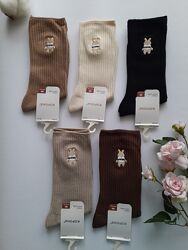 Шкарпетки жіночі однотонні ультрависокі в рубчик з вишивкою преміум якість