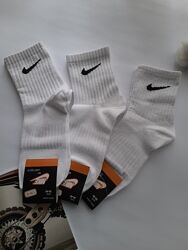 Шкарпетки жіночі білі з брендовим значком резинка в рубчик україна