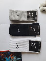 Шкарпетки чоловічі високі з брендовим значком і резинкою в рубчик