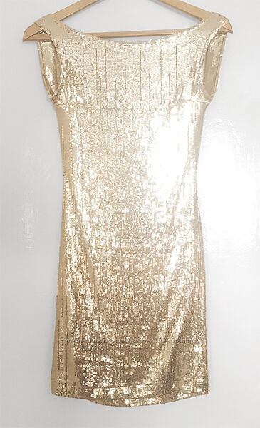 Коктейльна сукня із золотої паєткової тканини
