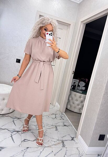 Легка літня сукня з поясом і горловиною-стійкою  стиль та комфорт в одному