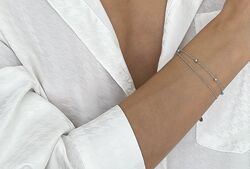 Жіночий срібний браслет покритий родієм