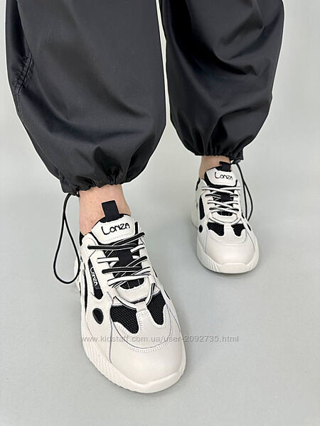 Кросівки жіночі шкіряні світло-бежеві з чорними вставками сітки Арт 5116