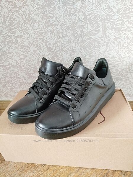 Шкіряні жіночі кросівки